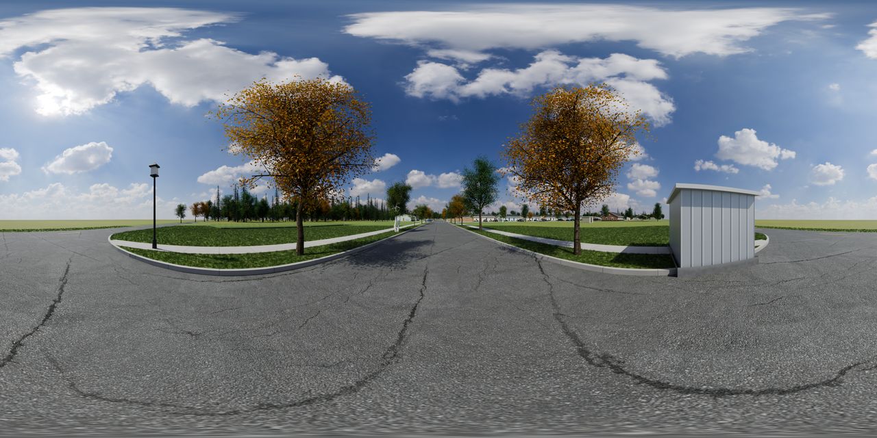 A lane leading in from the road between lawns and young trees, with the homes farther in.