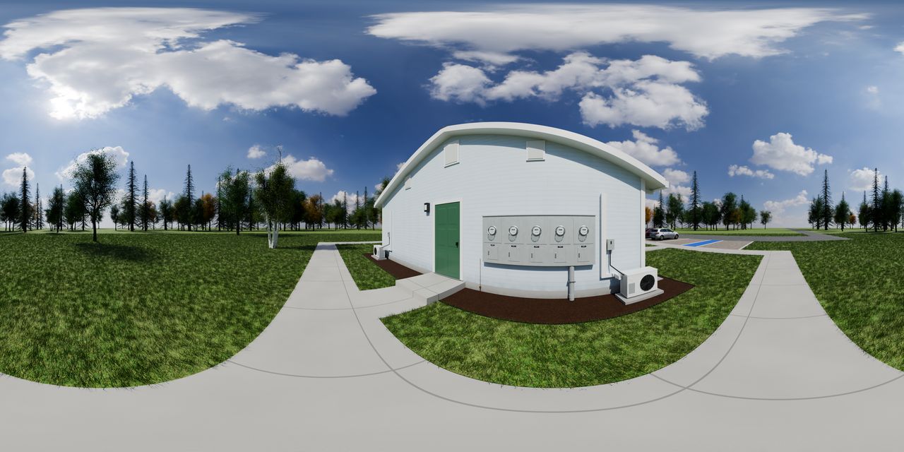 The end wall of the 4-plex with the owner door to the spine, a bank of five electric meters and an outdoor heat pump unit at each corner.